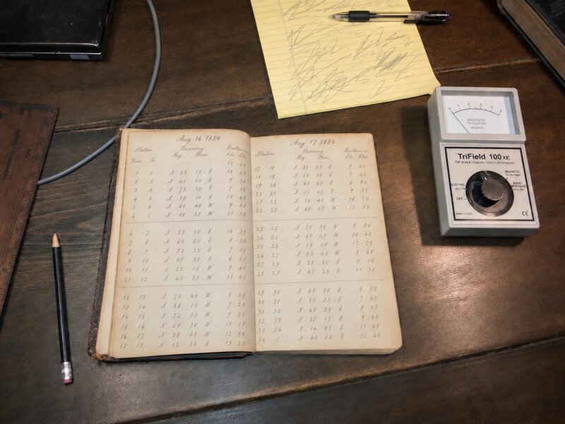 Foote journal open on kitchen table next to EMF meter and research notes, 2002